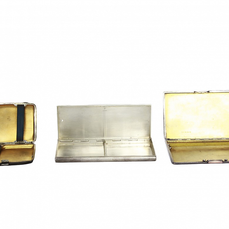 Pair of cigarette cases and a makeup powder box, English silver.
