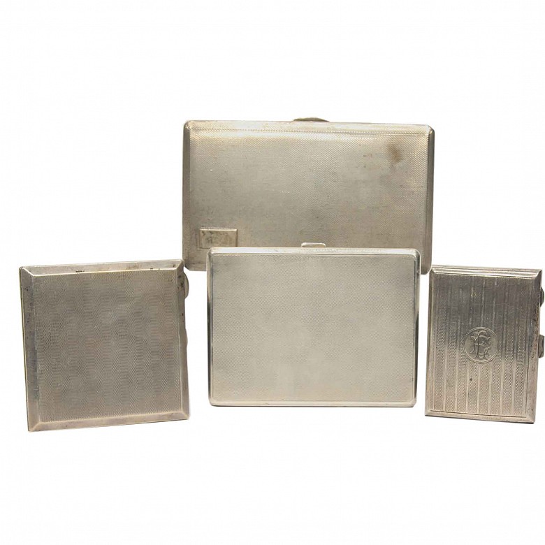 Lot of 4 cigarette cases, english silver, middle 20th century.