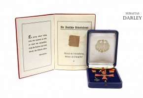 Medallas y libreta del frente Alemán del Trabajo, ca. 1936-1943.