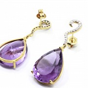 Earrings in 18 k yellow gold with amethysts and diamonds.