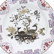 Plato en porcelana familia rosa, dinastía Qing.