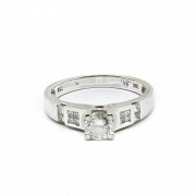 Solitaire diamond ring.