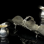 Four small silver objects