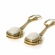 Large earings with 18k gold assembling.