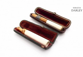Two mouthpieces in meerschaum, amber and silver, 19th century