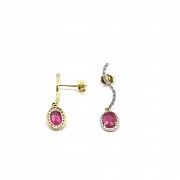 Earrings in 18k yellow gold with rubies and diamonds.