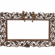 Vicente Andreu. Two fretworked wooden frames with cherubs, 20th century.