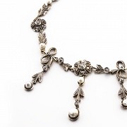 Necklace with cultured pearls and diamonds, circa 1910.