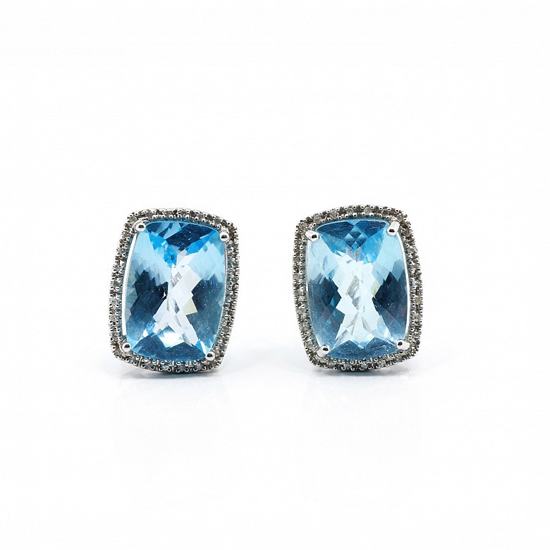 18k white gold earrings with topaz and diamonds.