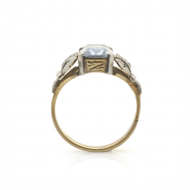 18k Gold ring with diamonds and a blue stone