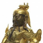 Figura de bronce dorado 