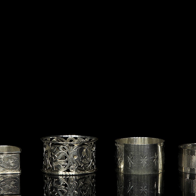 Collection of eleven sterling silver napkin rings