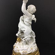 White ceramic angel figure, painted with gold leaf. - 2