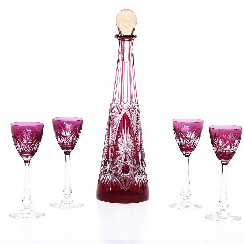 Set of decanter and four red glass goblets, Baccarat.