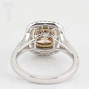 18k white gold ring with fancy diamond.