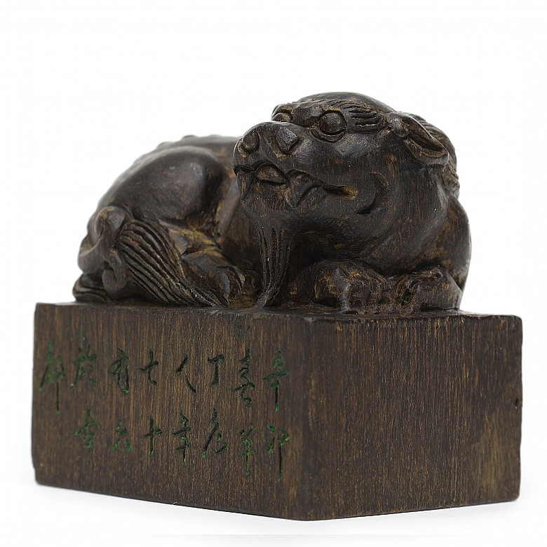 Wooden stamp with carved foo lion, 1951.