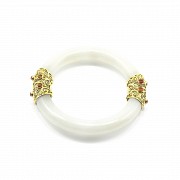 White jade bangle with 18k gold setting and gems.