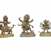 Three bronze Tibetan figures.