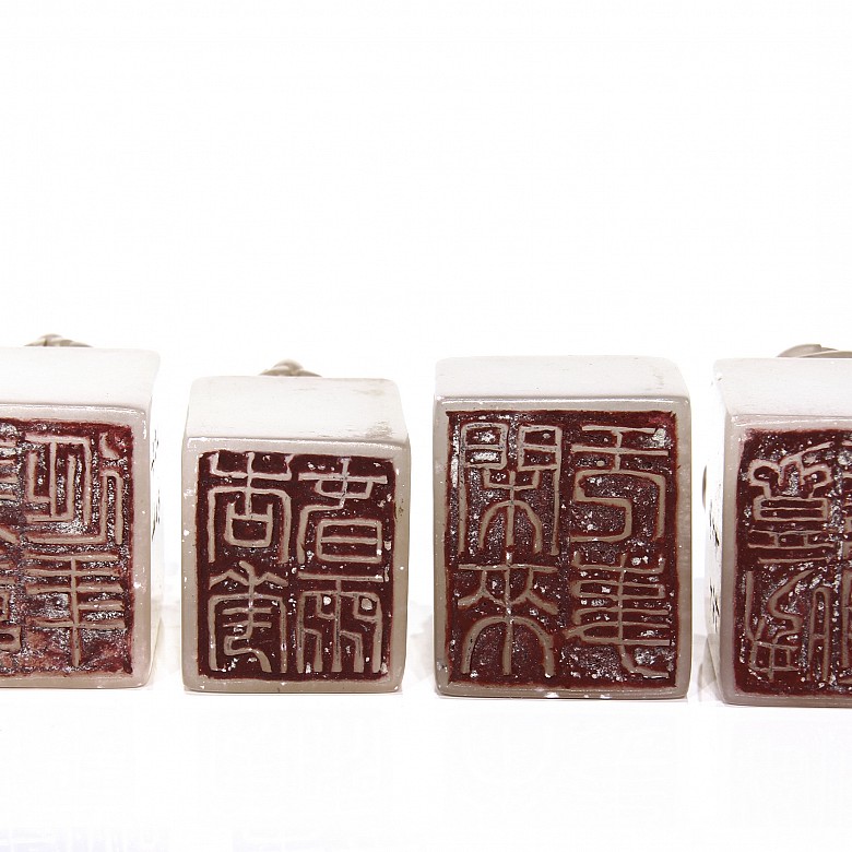 Four carved jade stamps, 20th century