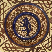 Glazed ceramic plate with metallic lustre and cobalt blue lustre, 20th century