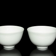 Pair of white-glazed 