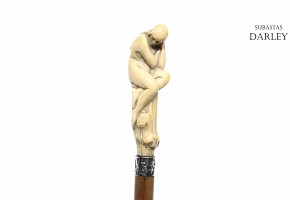 Wooden cane and fist in the shape of a woman, pps.s.XX