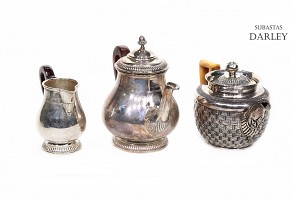 Group of three punched silver teapots, pps.s.XX