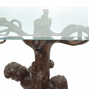Vicente Andreu. Table console with carved wooden base and glass top, 20th century.