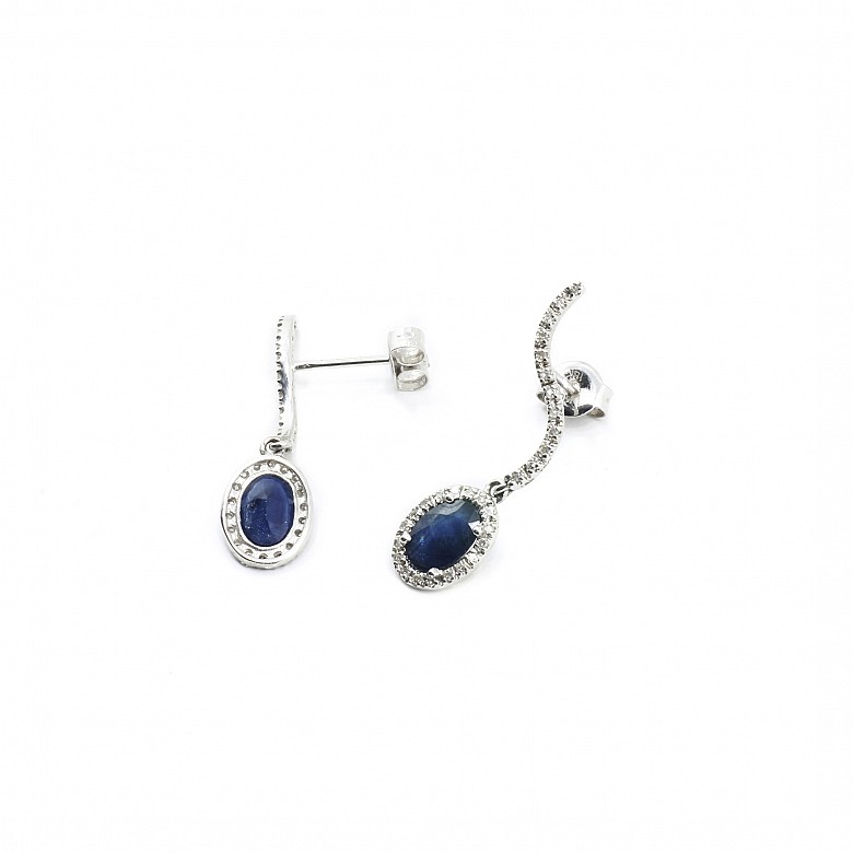 18k white gold and sapphire earrings.