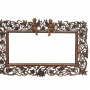 Vicente Andreu. A fretworked wooden frame with cherubs, 20th century