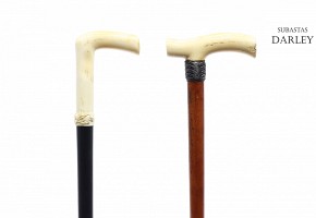Pair of canes with carved ivory head, early 20th century