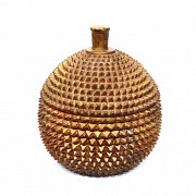 Pineapple-shaped wooden box.