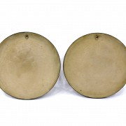Pair of alabaster medallions, 20th century