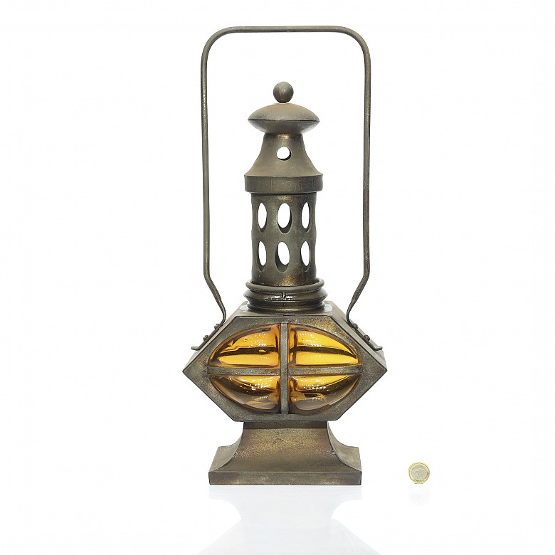 Metal and glass lantern.