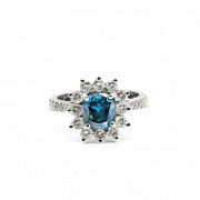 18k white gold ring with blue Fancy diamond.