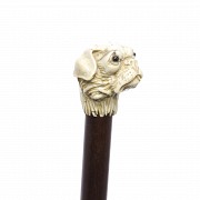 Wooden walking stick and fist in the shape of a dog's head, early 20th century