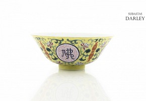 A famille rose yellow-ground bowl, Qianlong seal mark.