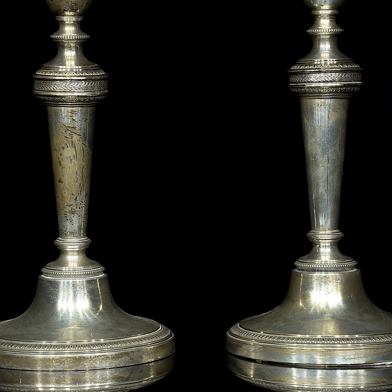 Pair of punched silver candlesticks, 20th century