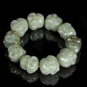 Jade bracelet with Buddha heads, 20th century