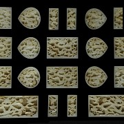 A set of twenty carved jade belt plaques, Ming dynasty