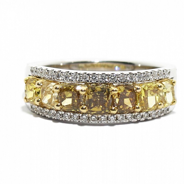 Half alliance ring with yellow fancy diamonds.
