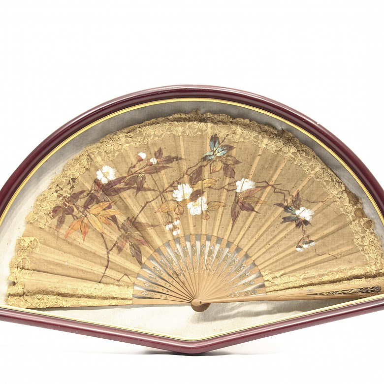 Fan framed with carved wooden rods, 20th century