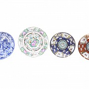 Four enameled porcelain plates, 20th century