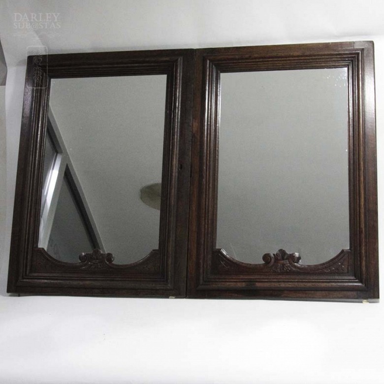 Two wooden mirrors