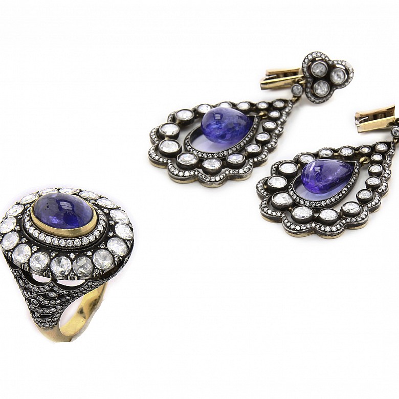 Ring and earring set in 18k gold with tanzanite and diamonds.
