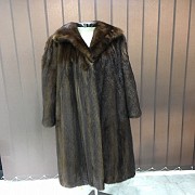 Nice dark brown mink fur coat and long cut.