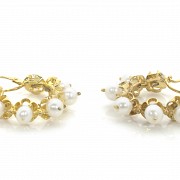 Earrings in 18k yellow gold and pearls