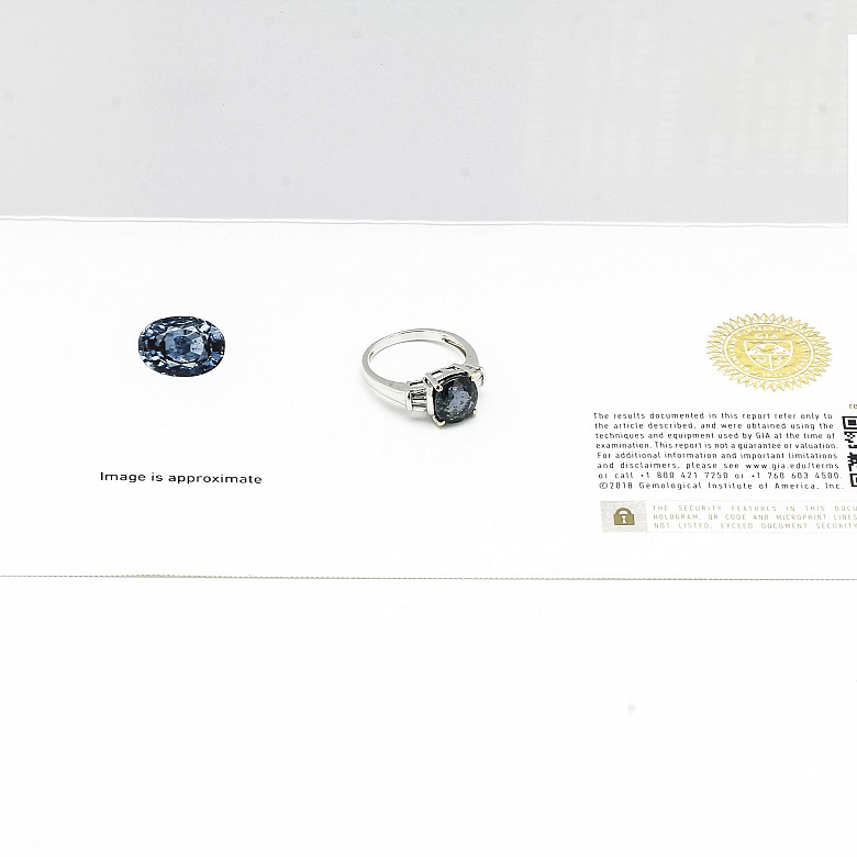 Sapphire and diamond ring in 18k white gold.