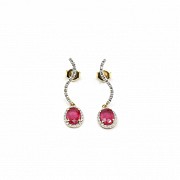 Earrings in 18k yellow gold with rubies and diamonds.