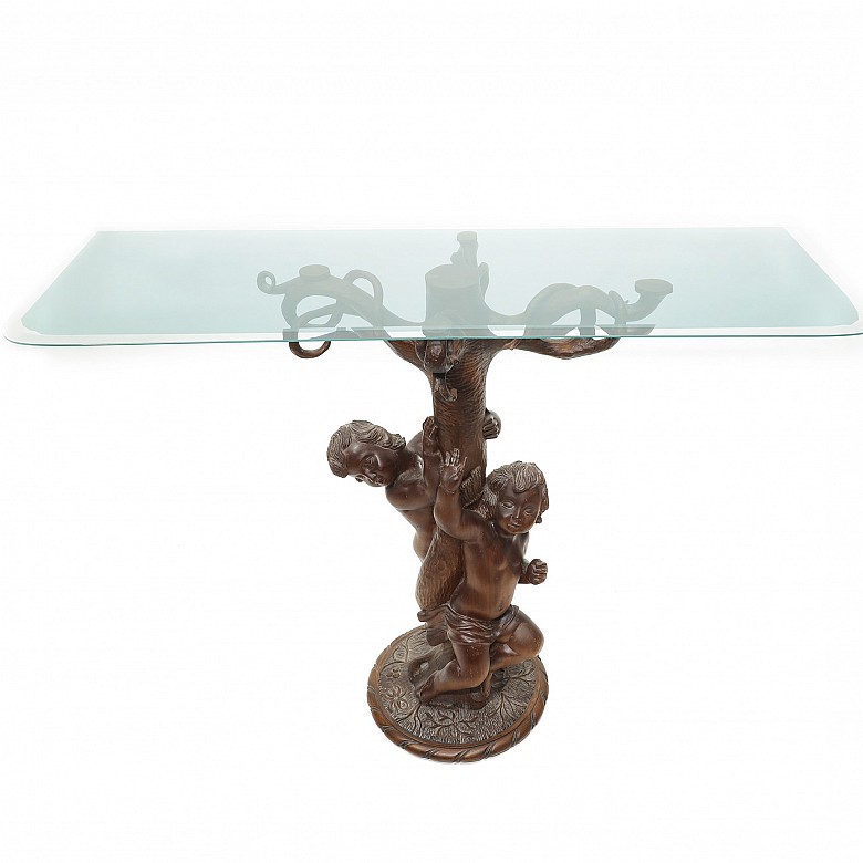 Vicente Andreu. Table console with carved wooden base and glass top, 20th century.